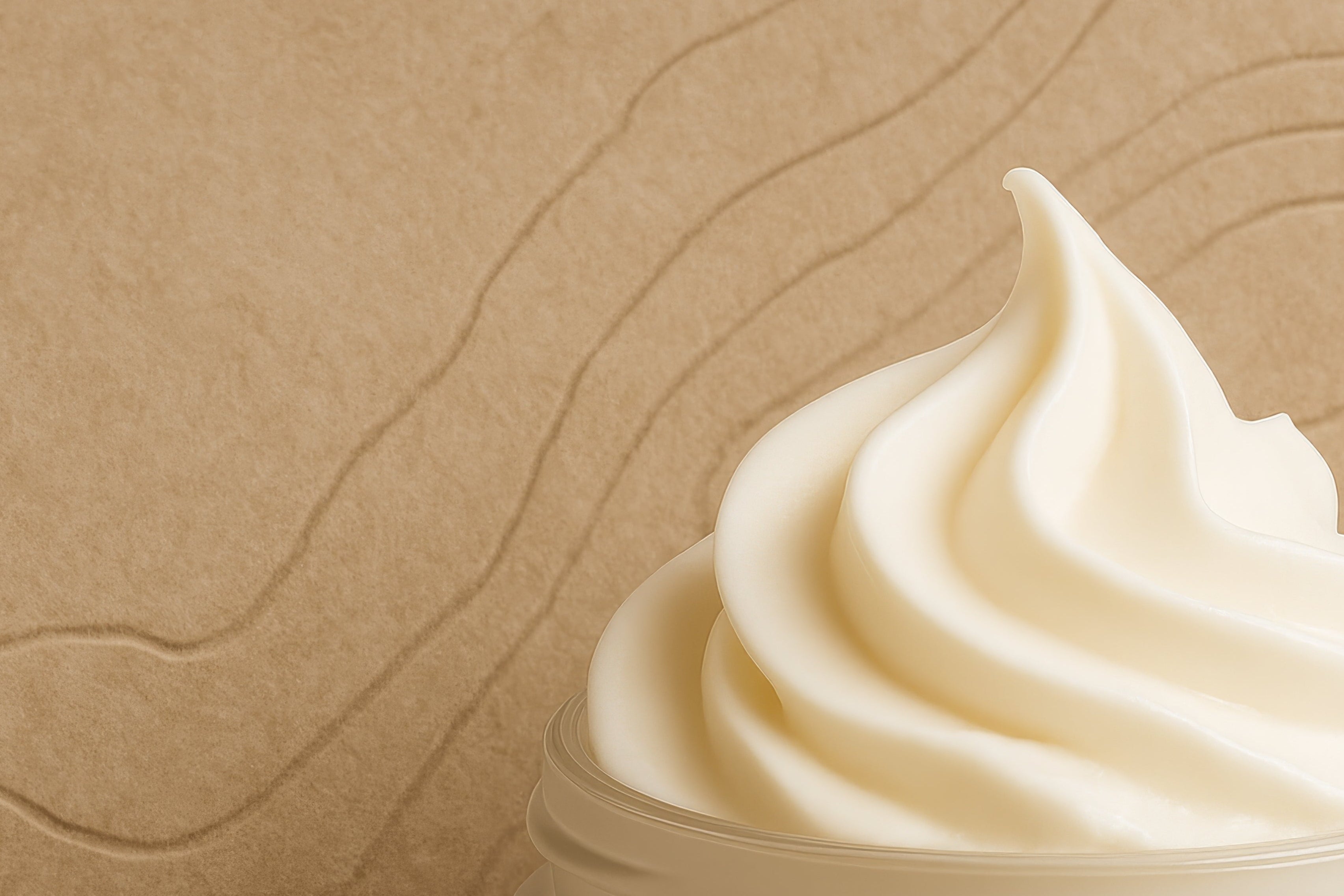 Jar of white cream on a brown textured background